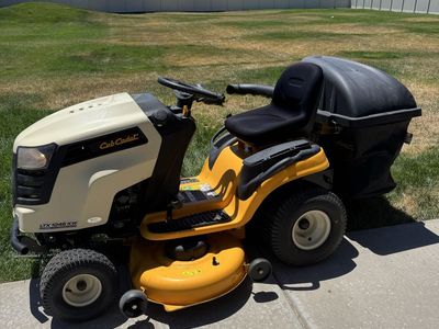 Cub Cadet LTX 1046 KW Riding Lawn Mower Tractor with Bagger Attachment