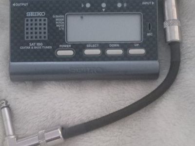 Seiko SAT 100 Guitar & Bass Tuner - Compact & Reliable Instrument Tuning Device