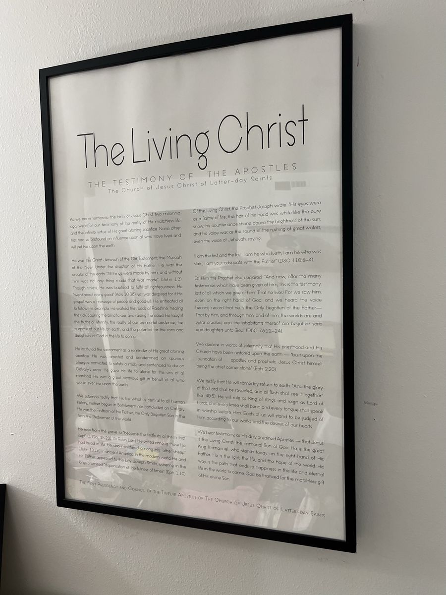Two Large black frames and LDS posters