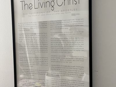 Two Large black frames and LDS posters
