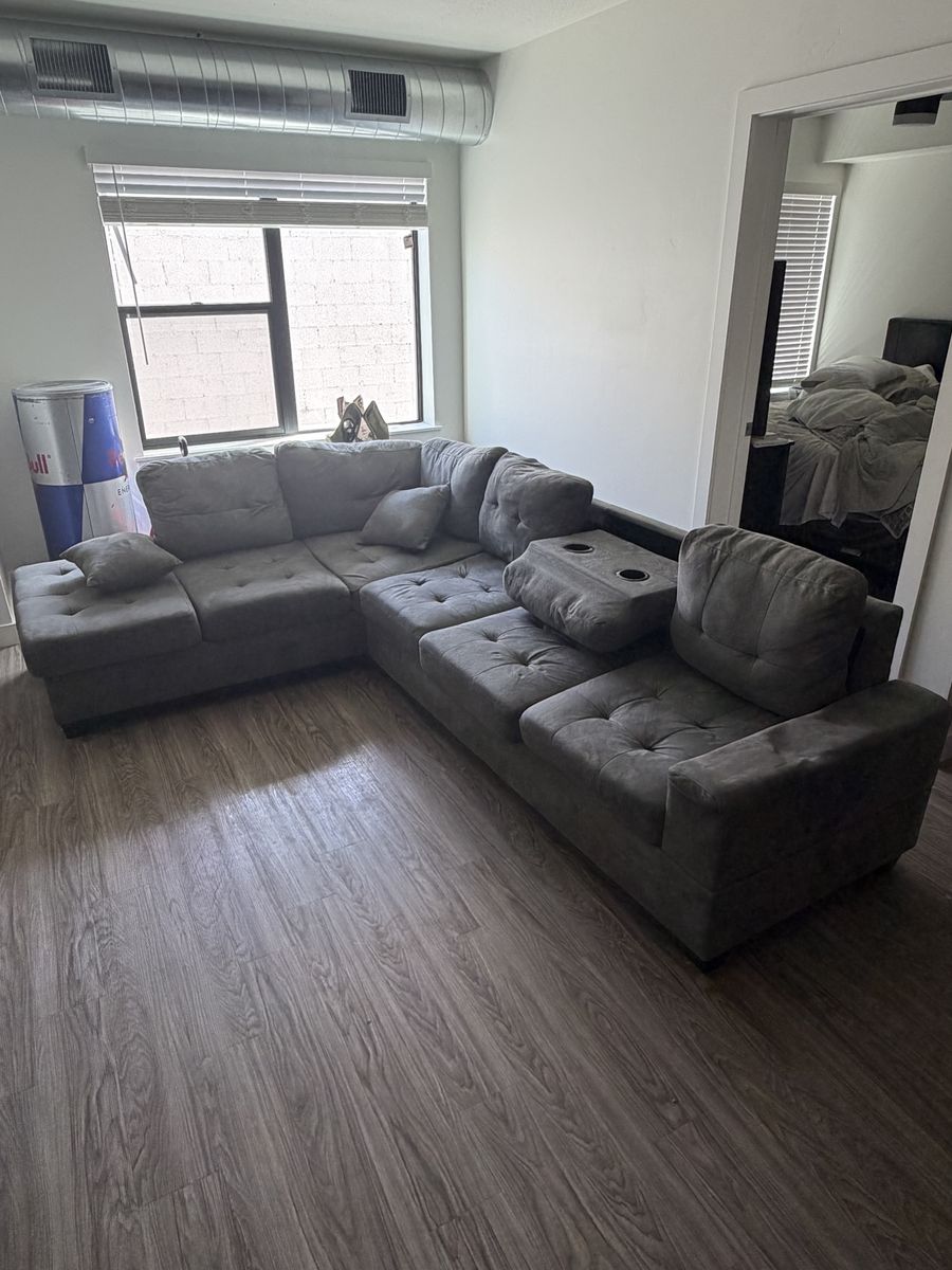 Spacious Grey Sectional Sofa Couch with Storage Ottoman and Cupholders - Great Condition