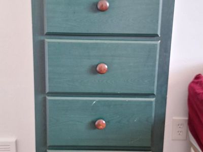 Tall, green dresser