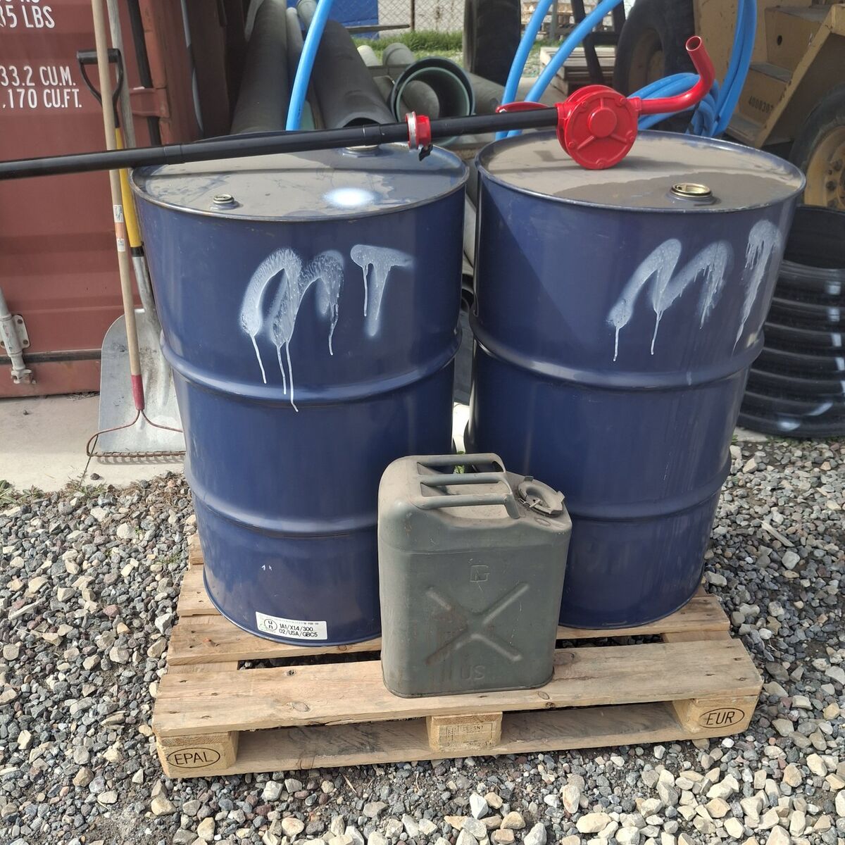 steel barrels and Jerry can