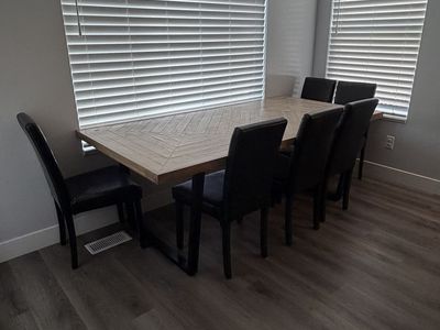 Modern 7-Piece Dining Set - Wood Table with Black Metal Base & 6 Black Faux Leather Chairs