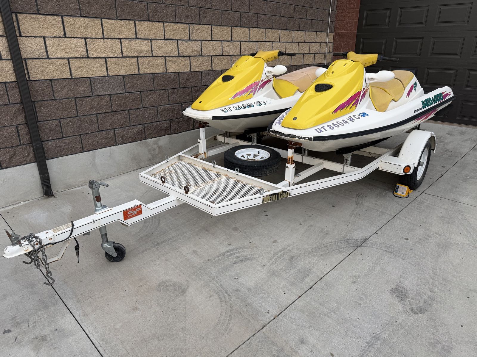 2 1996 SeaDoo GTI’s with trailer