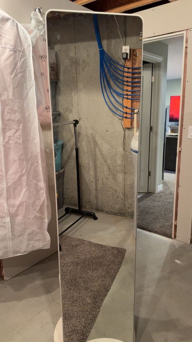 Mirror with coat rack