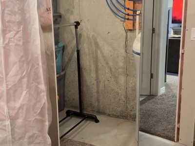Mirror with coat rack