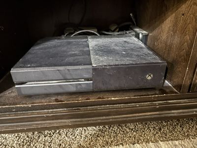 Xbox 1 with blue controller