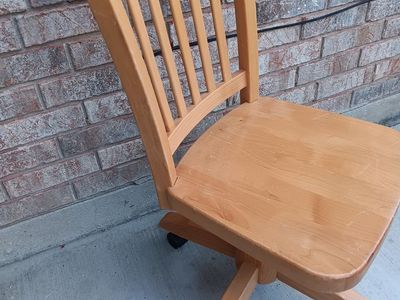 Wooden rolling office chair