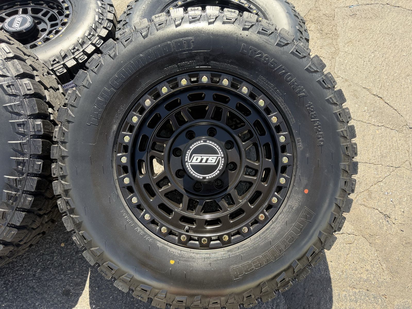 17” Dropstar DTS Black 8 Lug 8x6.5 33” AmeriTread 295/70R17 33x11.50x17 Chevy GMC Dodge Ram pre 97 Ford