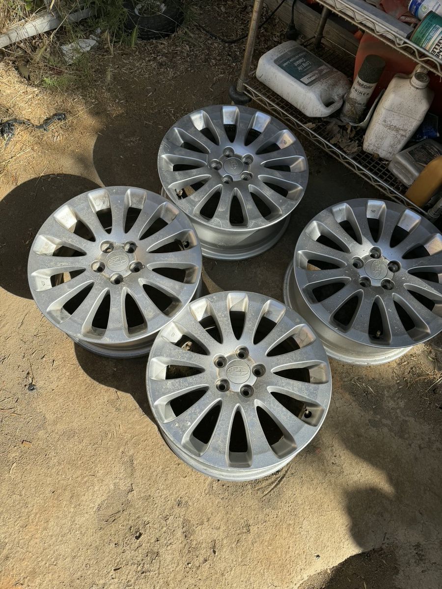 2008-2011 Subaru Impreza OEM Wheels. 5x100