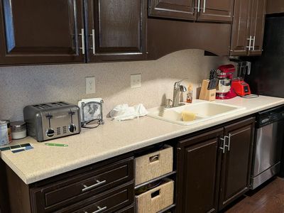 Dark Brown Painted Kitchen Cabinets Set with Brushed Nickel Hardware
