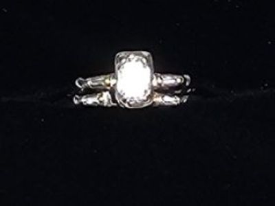 Gorgeous .50 carat emerald cut diamond engagement set!