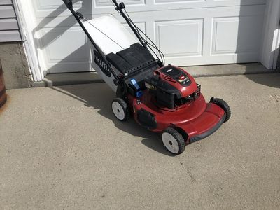 SELF PROPELLED TORO LAWN MOWER WITH A BRIGGS & STRATTON ENGINE