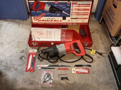 Milwaukee Sawzall with Metal and Wood Saw Blades