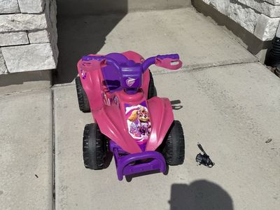 PAW Patrol Skye electric ride-on ATV in pink and purple.