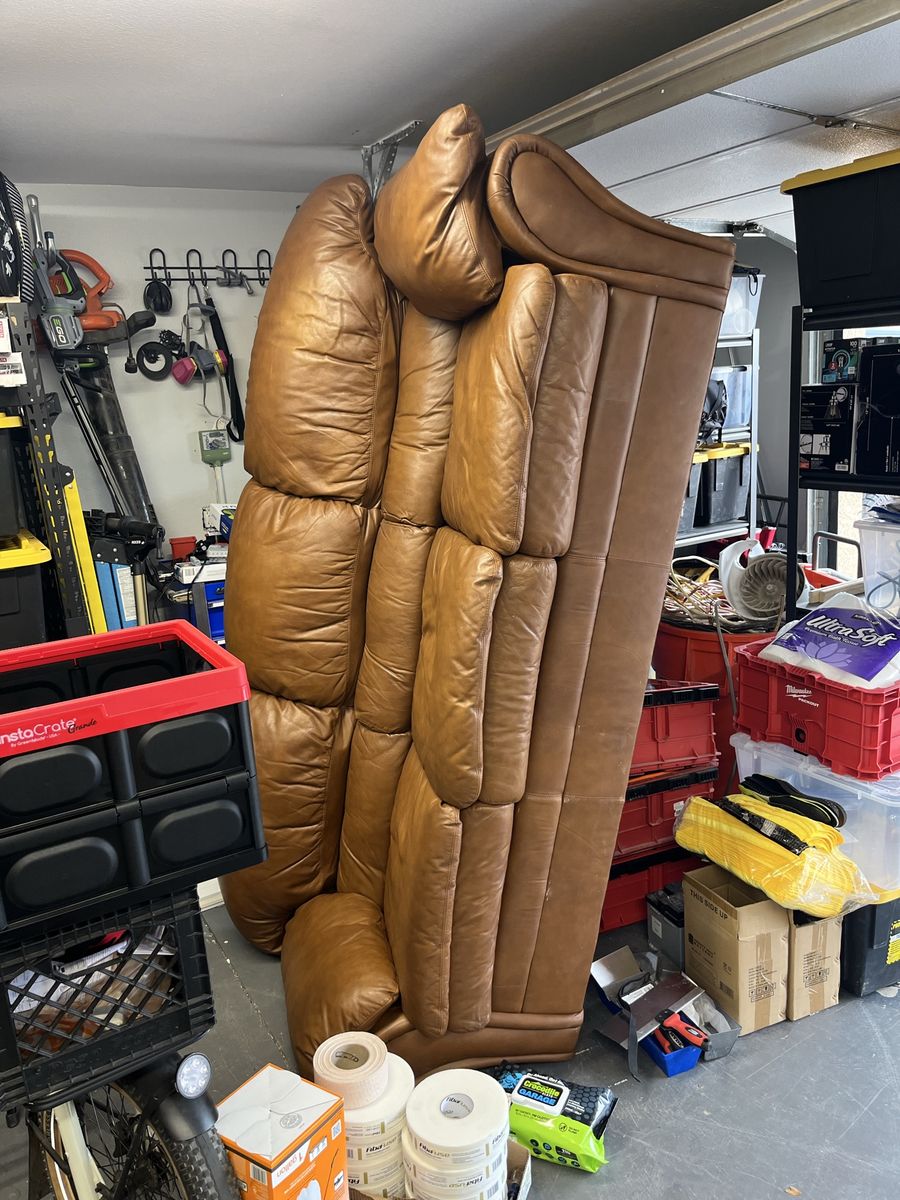 Leather couch in good condition just need to clear