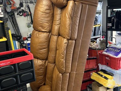 Leather couch in good condition just need to clear