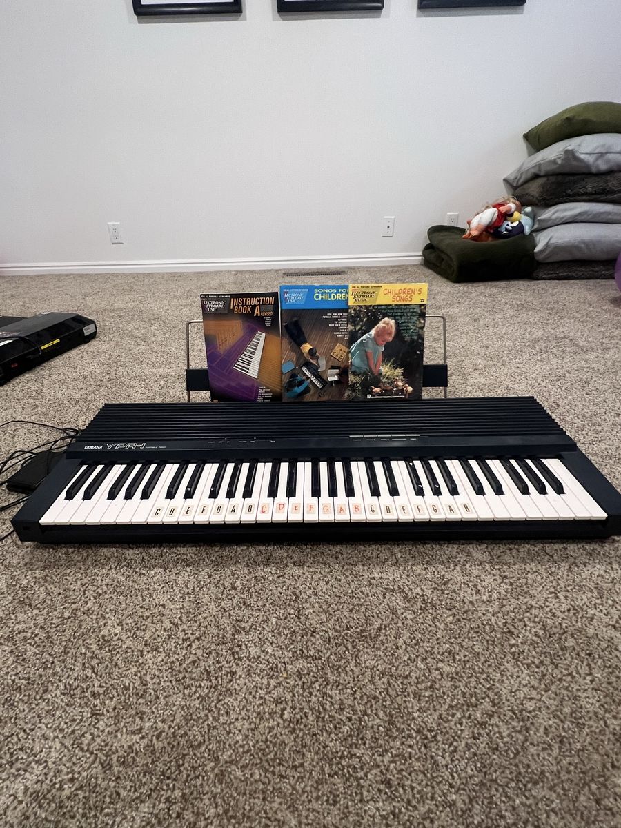 Yamaha YPR-9 Portable Piano with Sheet Music and Stand