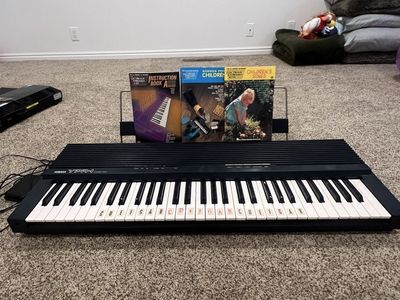 Yamaha YPR-9 Portable Piano with Sheet Music and Stand