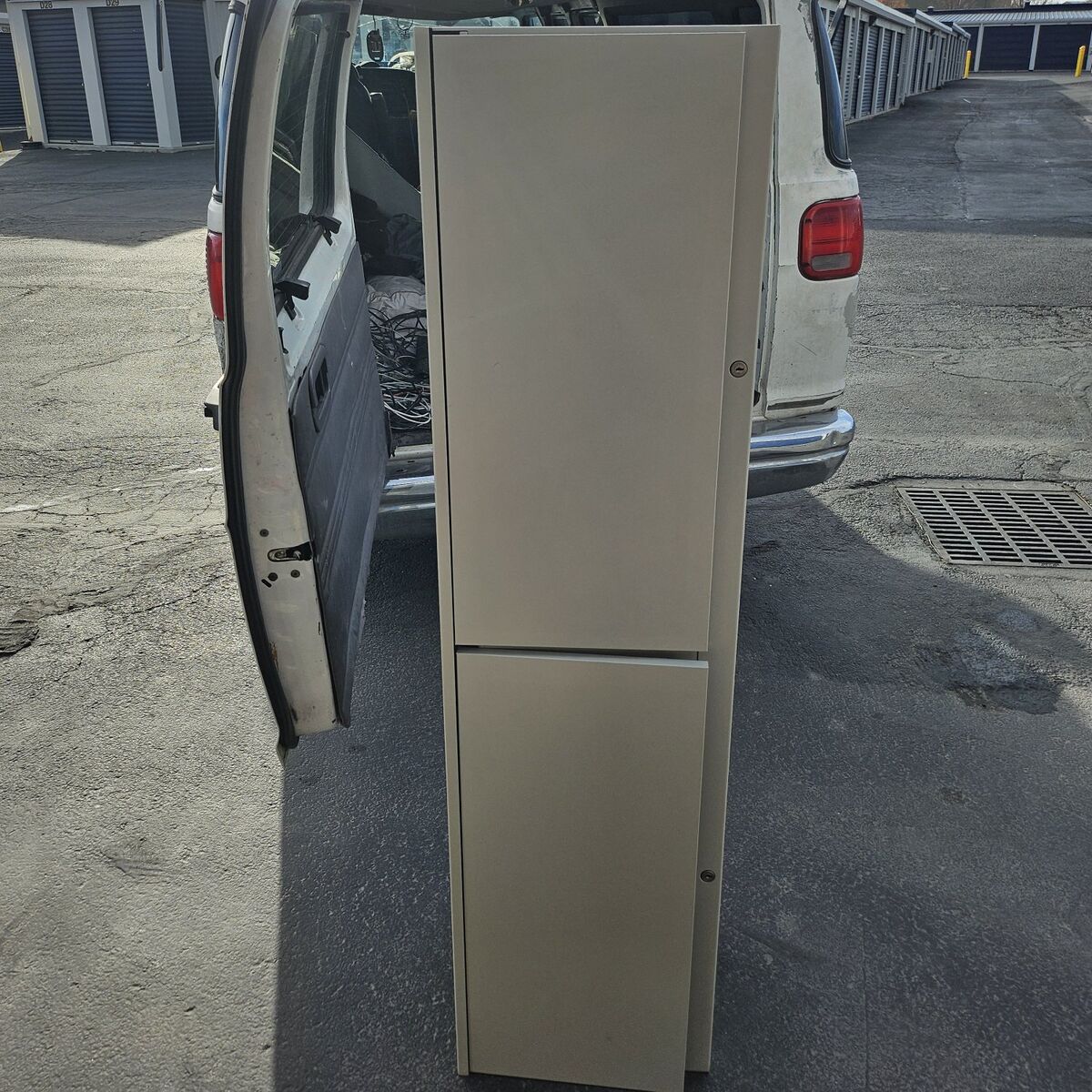 Two compartment locking cabinet