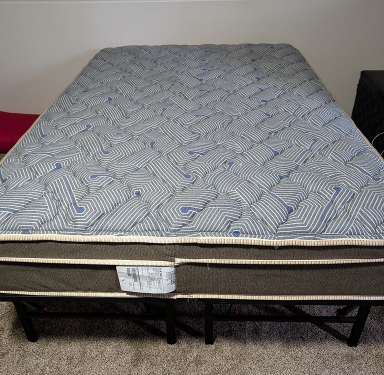 Barely used firm full mattress and frame