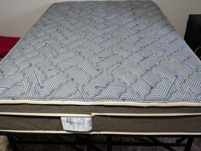 Barely used firm full mattress and frame