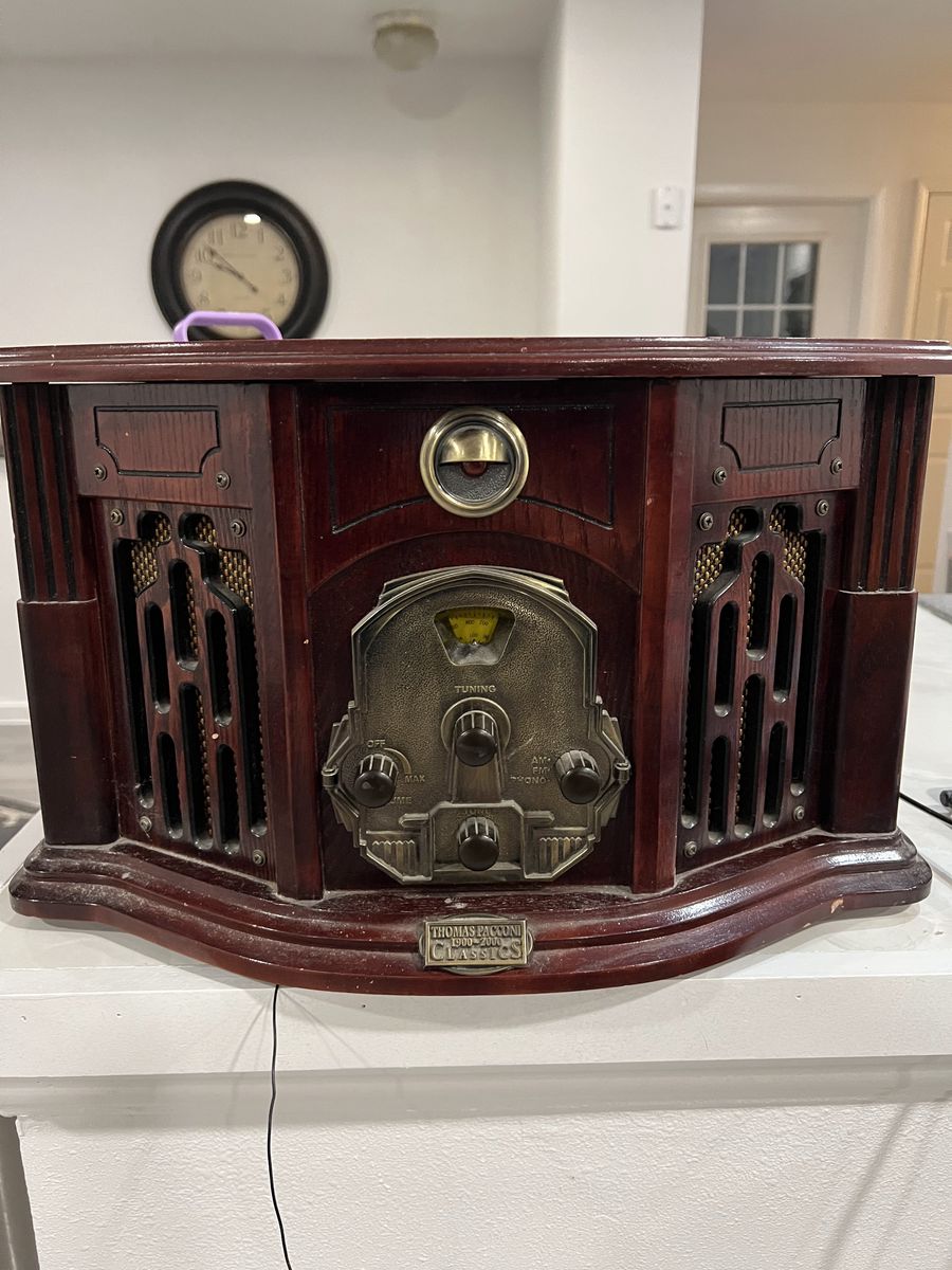 Record player/AM/FM radio/Cassette Player.