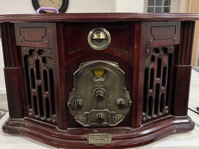 Record player/AM/FM radio/Cassette Player.