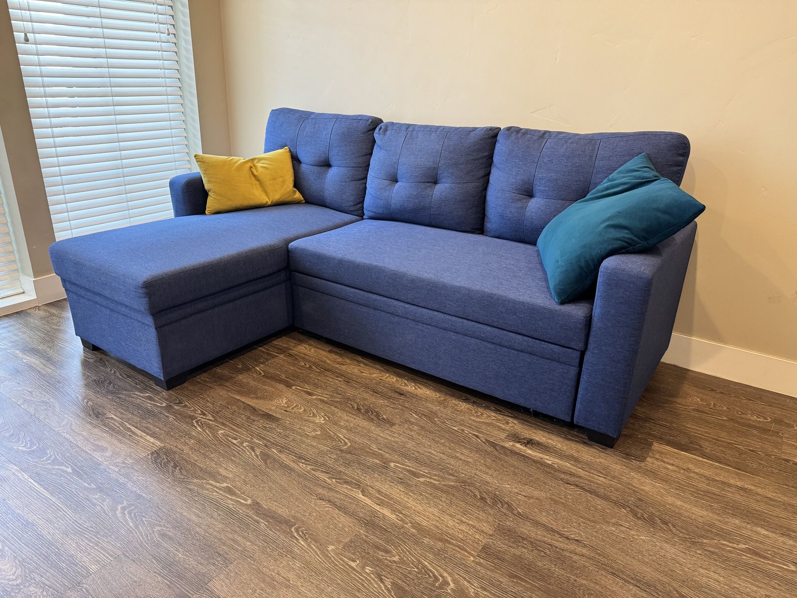 L-Shaped convertible sleeper couch blue