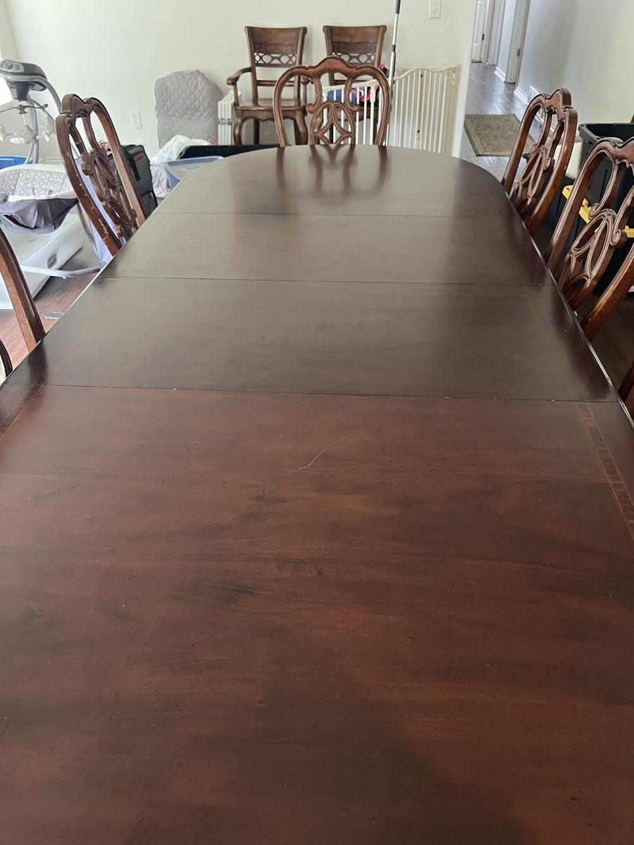 Dining room table with 10 chairs 2 leaves