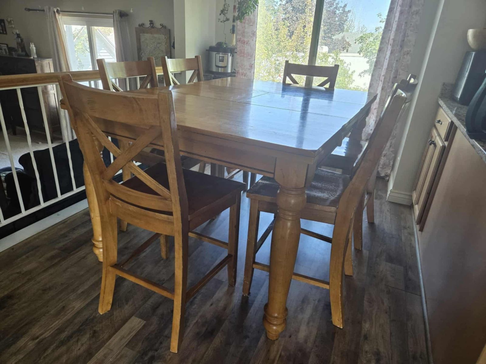Solid oak dining table and chairs