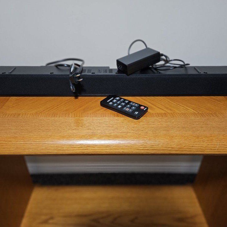 Black Soundbar with Remote and Power Adapter - Good Condition
