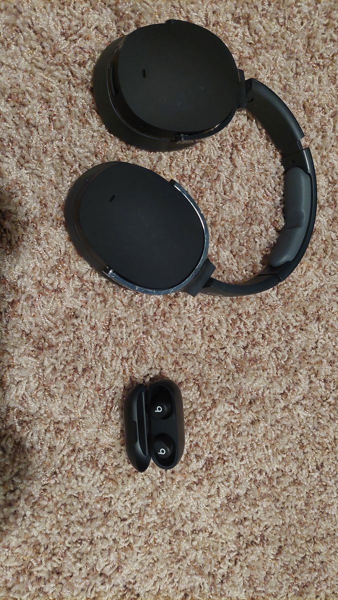 Pair of headphones and earbuds
