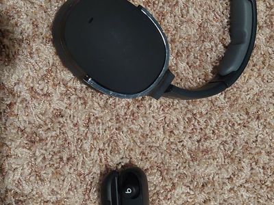 Pair of headphones and earbuds