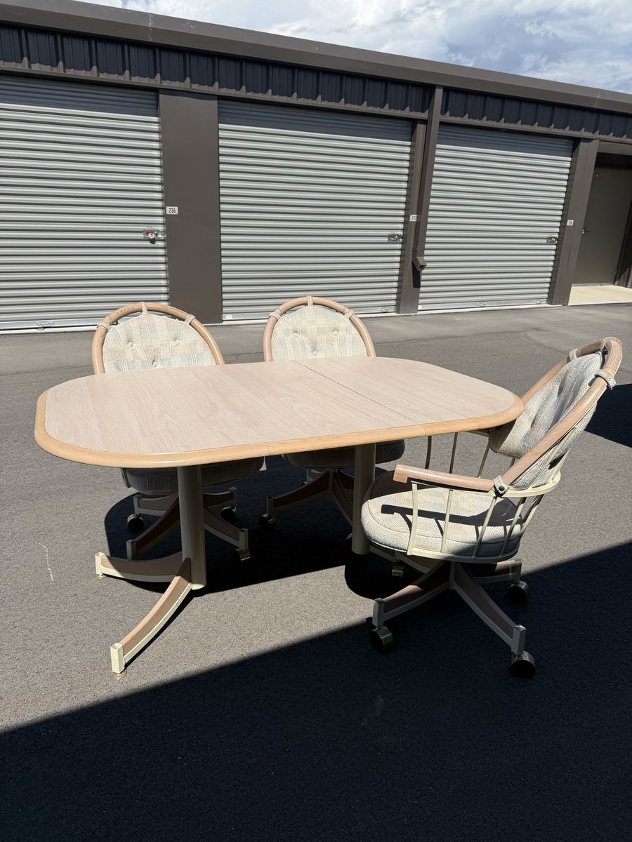 Oval Dining Table & 3 Swivel Caster Chairs - Beige/Wood Tone