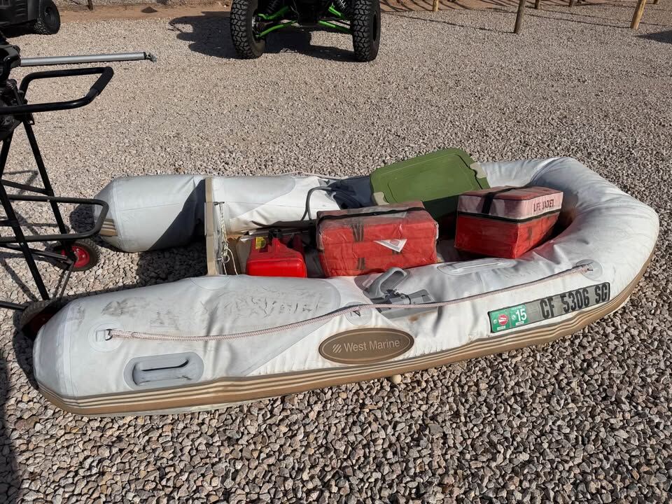 Inflatable Boat / Aluminum floor with 4=stroke Mercury outboard engine and extras!