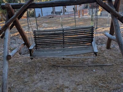 Rustic wooden swing