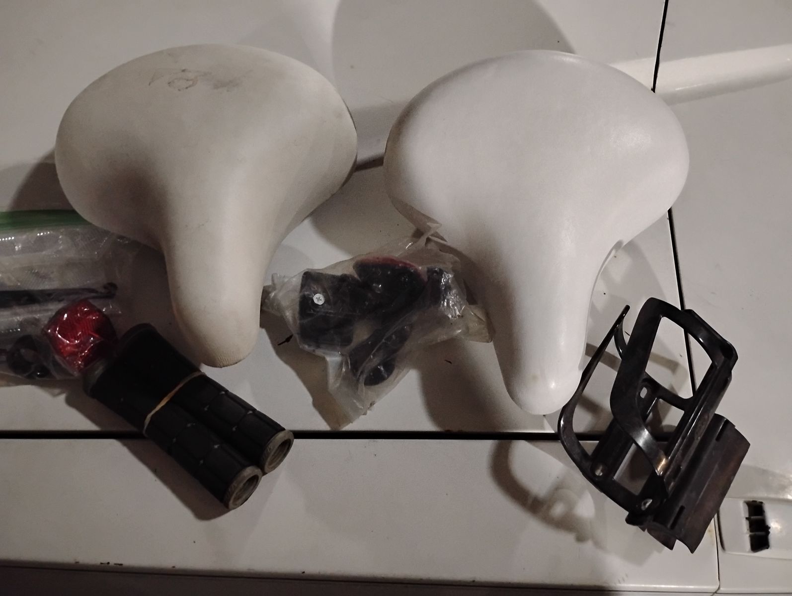 Used white bicycle bike seats and brand new reflectors