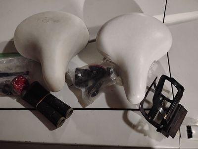 Used white bicycle bike seats and brand new reflectors