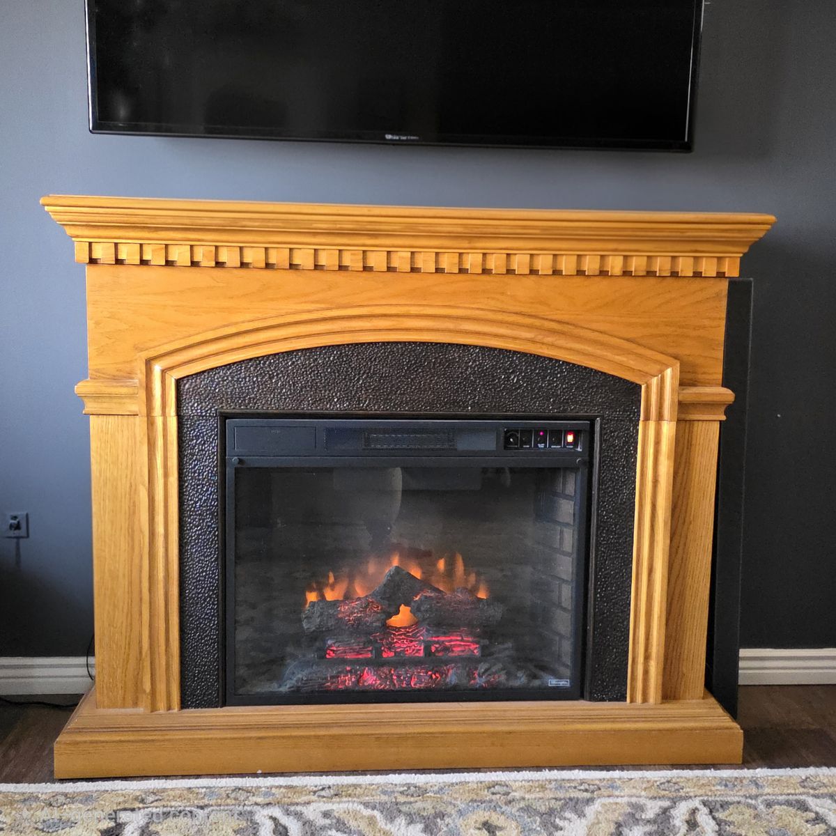 Large oak electric fireplace with blower
