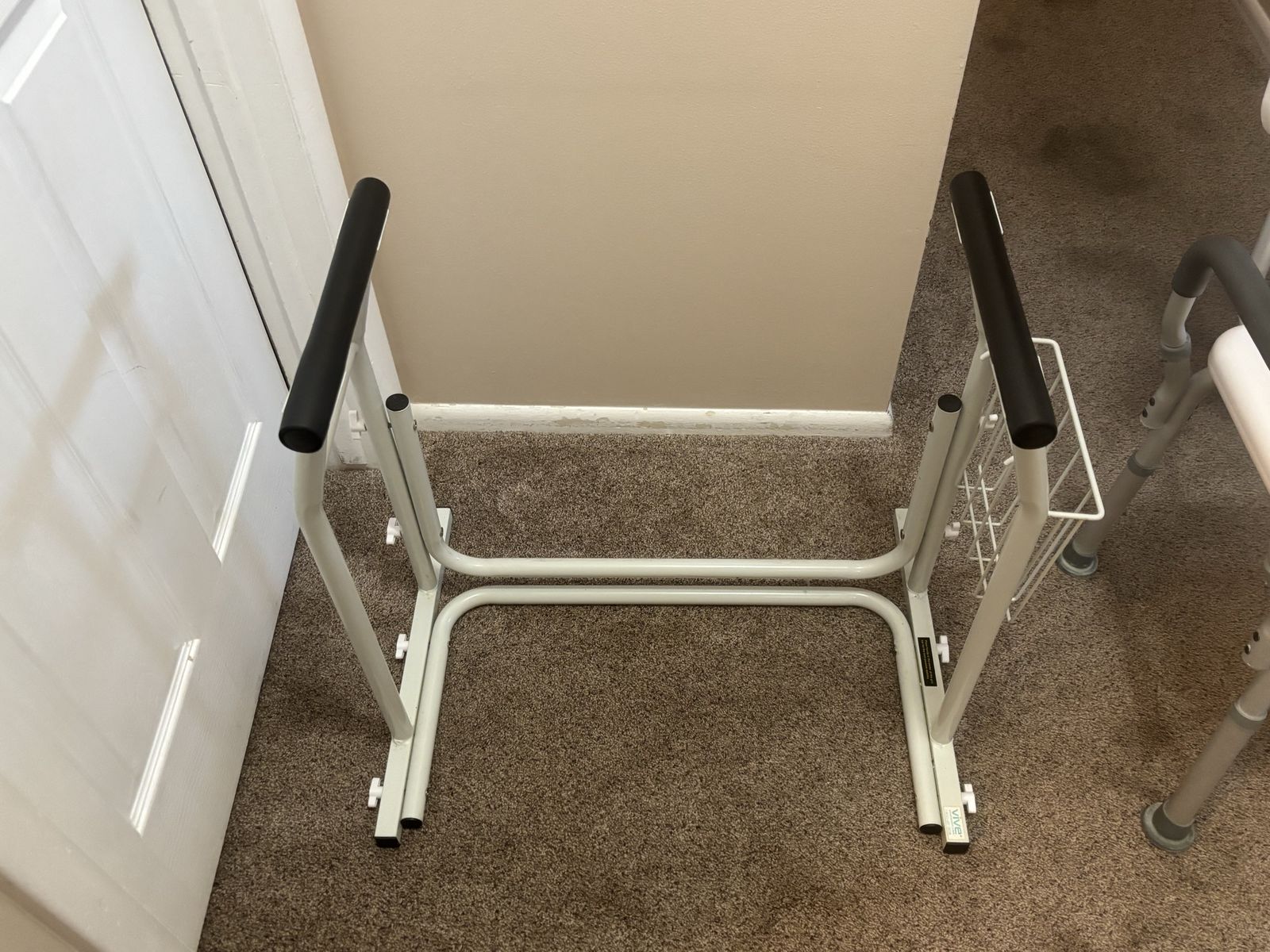 Toilet safety rail