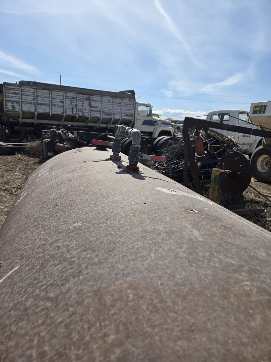 500 and two hundred fifty gallon farm tanks