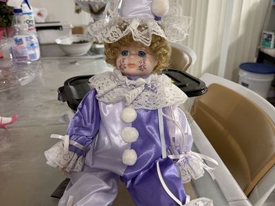 Vintage Porcelain Clown Doll with Purple and White Costume and Floral Face Paint