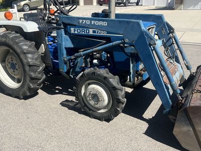 Ford 4x4 tractor and loader