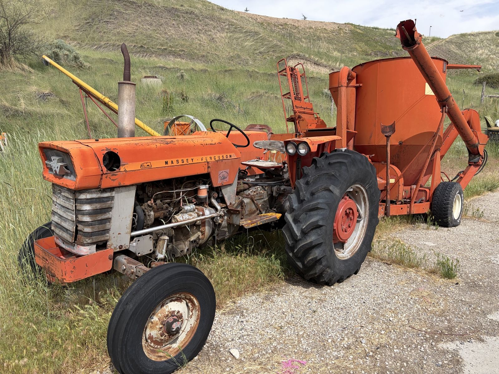 Massey Ferguson tractor with grain chopper