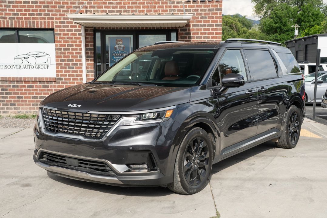 2024 Kia Carnival SX — rebuilt & branded title, 19% below market