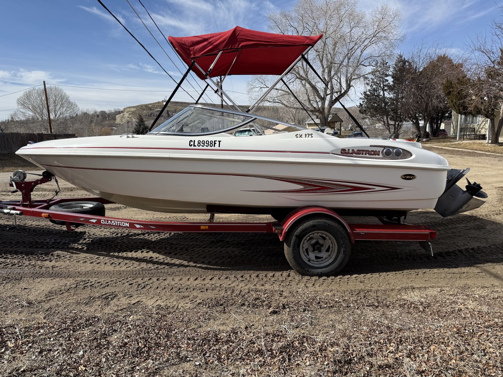 Glastron SX 175 Outboard Boat - White/Red with Trailer, Bimini Top