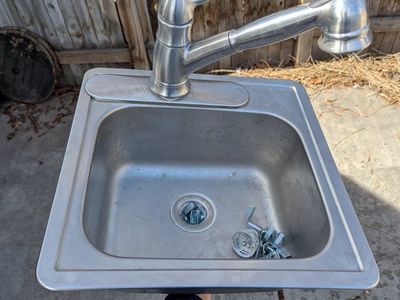 Small Stainless Sink with Delta Pull-Out Faucet