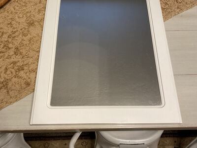 24"×17" white framed mirror